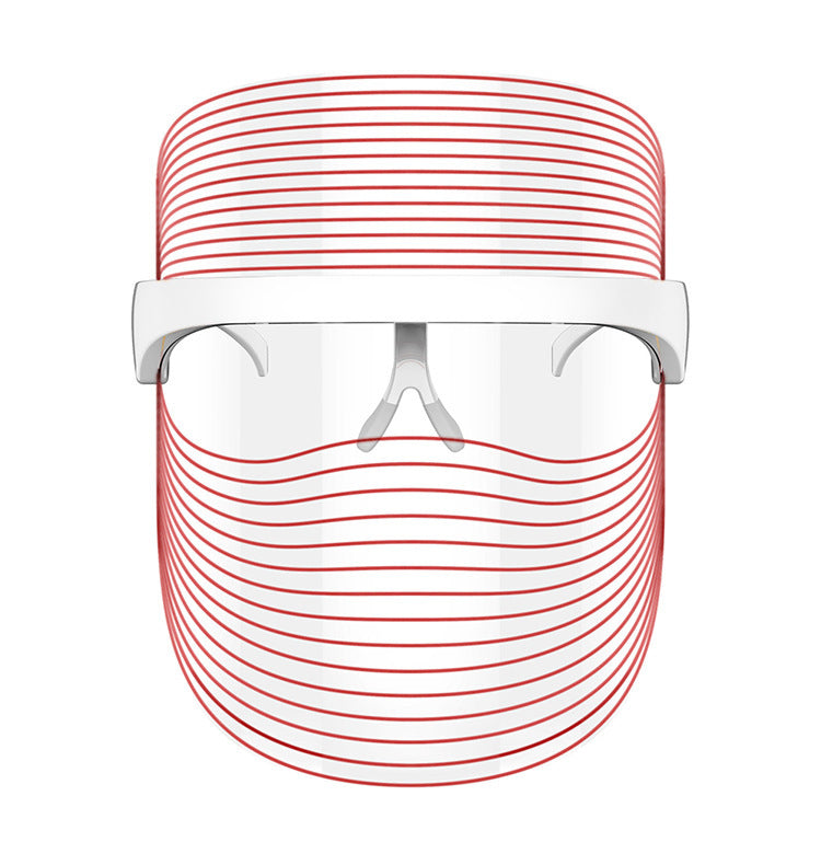 "Close-up of red light LED beauty mask with white frame and transparent visor, displayed on a white background"