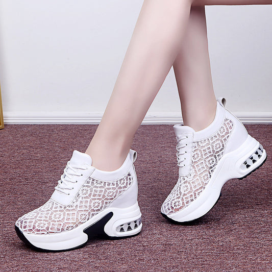 White breathable wedge sneakers with hollow mesh upper – summer casual style.
